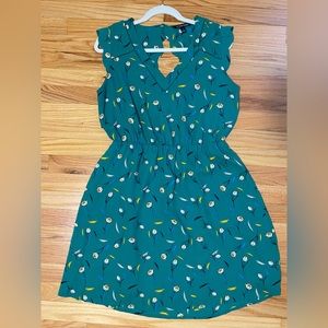 NWOT - beautiful green dress with key hole back. Stretchy waistband.